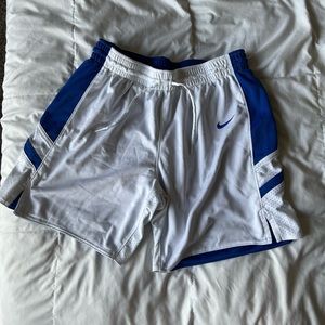 White and blue Nike shorts